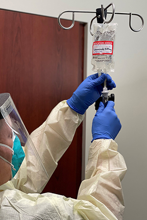 RN Diana Reitsma prepares sotrovimab which is administered by intravenous infusion r.jpg