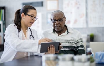 Doctor and patient looking at ipad